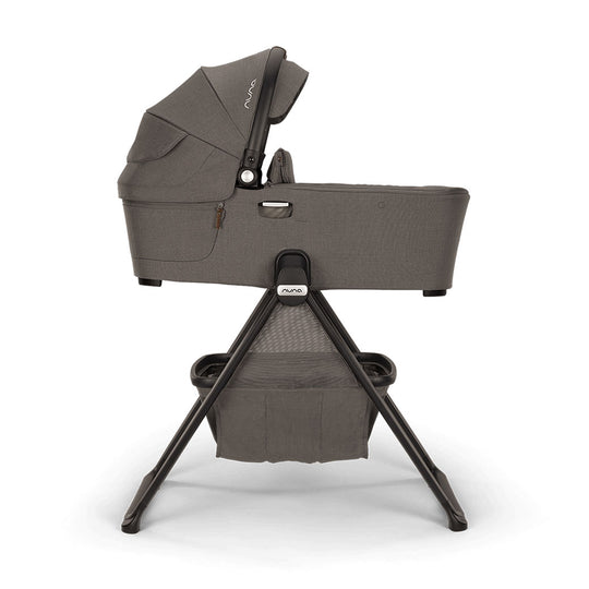 Side view of Nuna DEMI Next Bassinet + Stand in -- Color_Granite