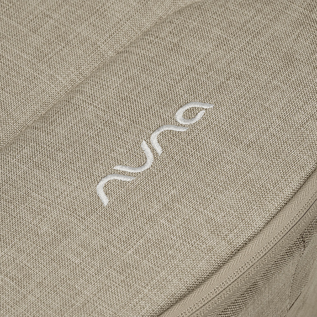 Closeup of material of the Nuna DEMI Next Bassinet + Stand in -- Color_Hazelwood
