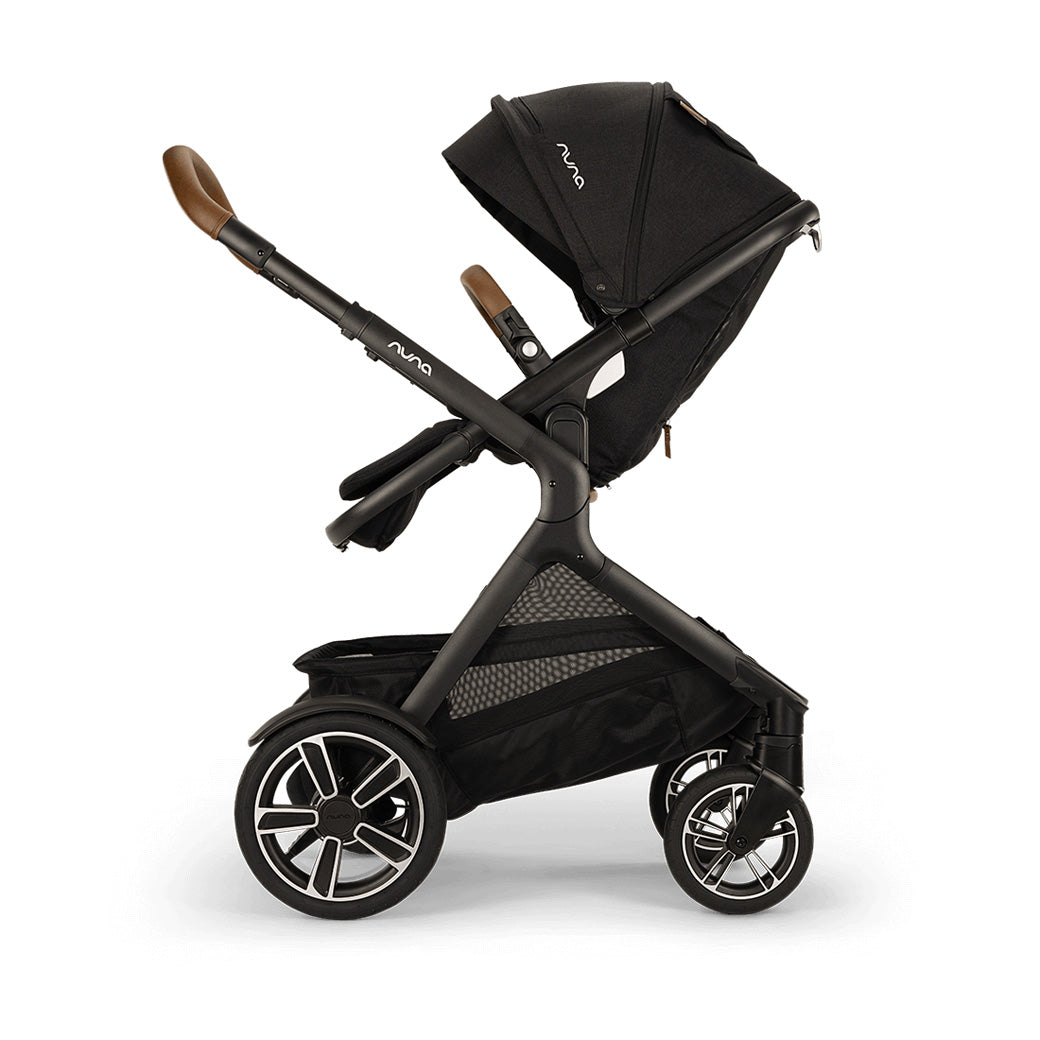 Side view of reversed Nuna DEMI Next Stroller in -- Color_Caviar