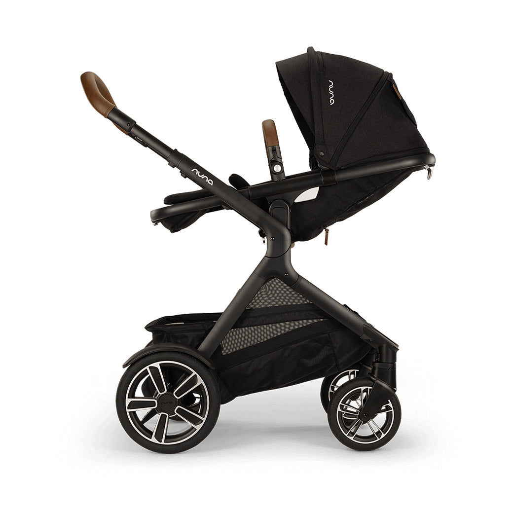 Side view of reversed reclined Nuna DEMI Next Stroller in -- Color_Caviar
