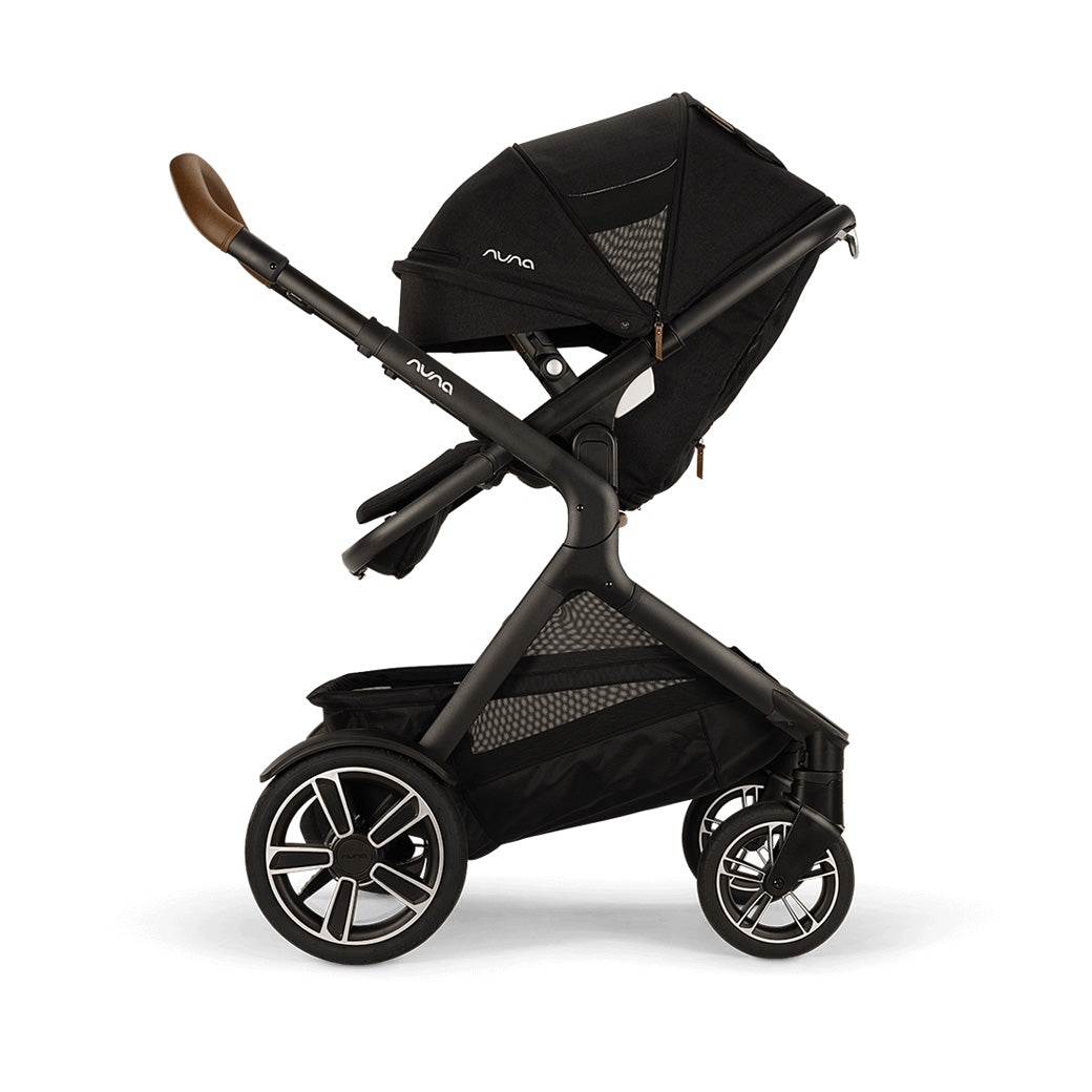 Side view of reversed Nuna DEMI Next Stroller with canopy down in -- Color_Caviar