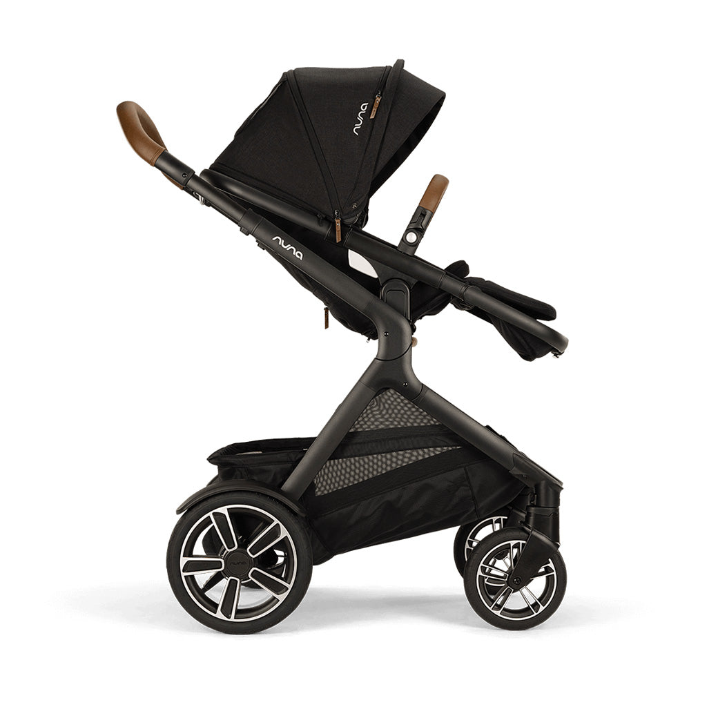 Side view of slightly reclined Nuna DEMI Next Stroller in -- Color_Caviar