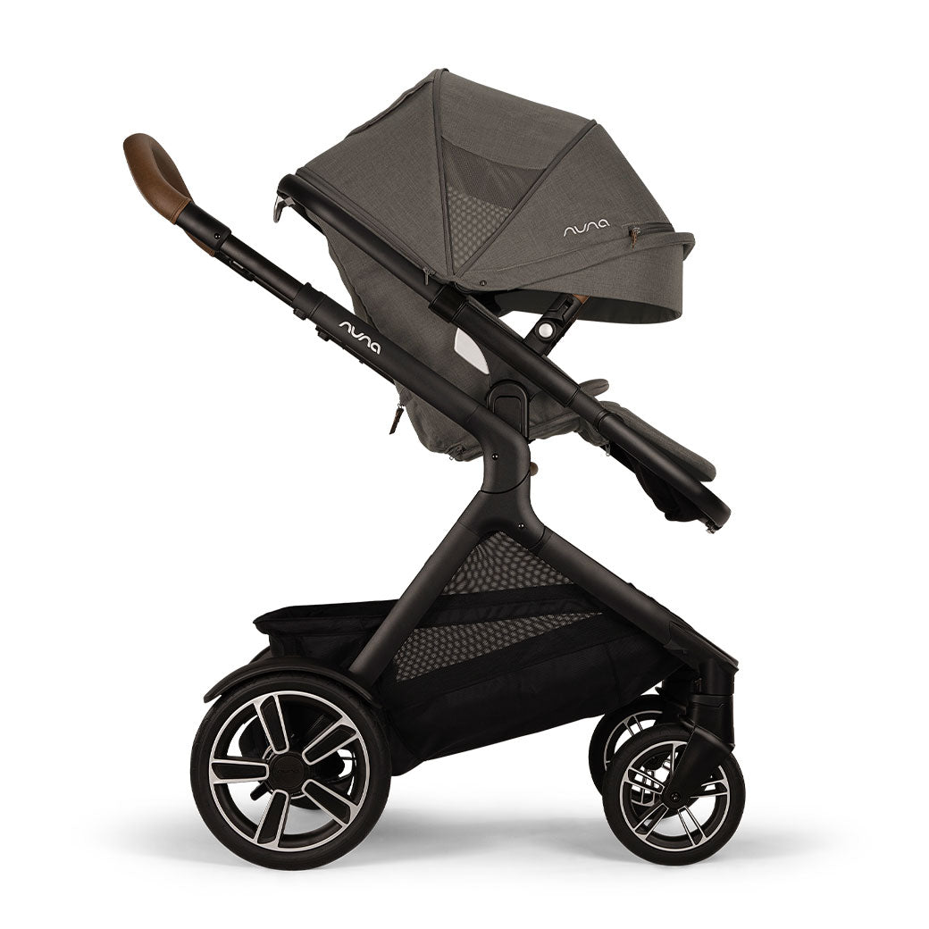 Side view of Nuna DEMI Next Stroller with canopy down  in -- Color_Granite