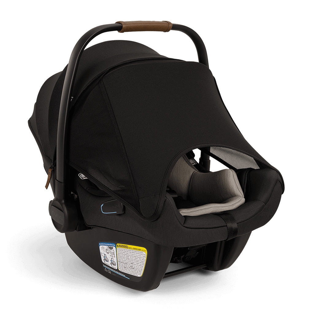 Nuna PIPA Aire Infant Car Seat + PIPA Series Base without the base with sun protector down  in -- Color_Caviar