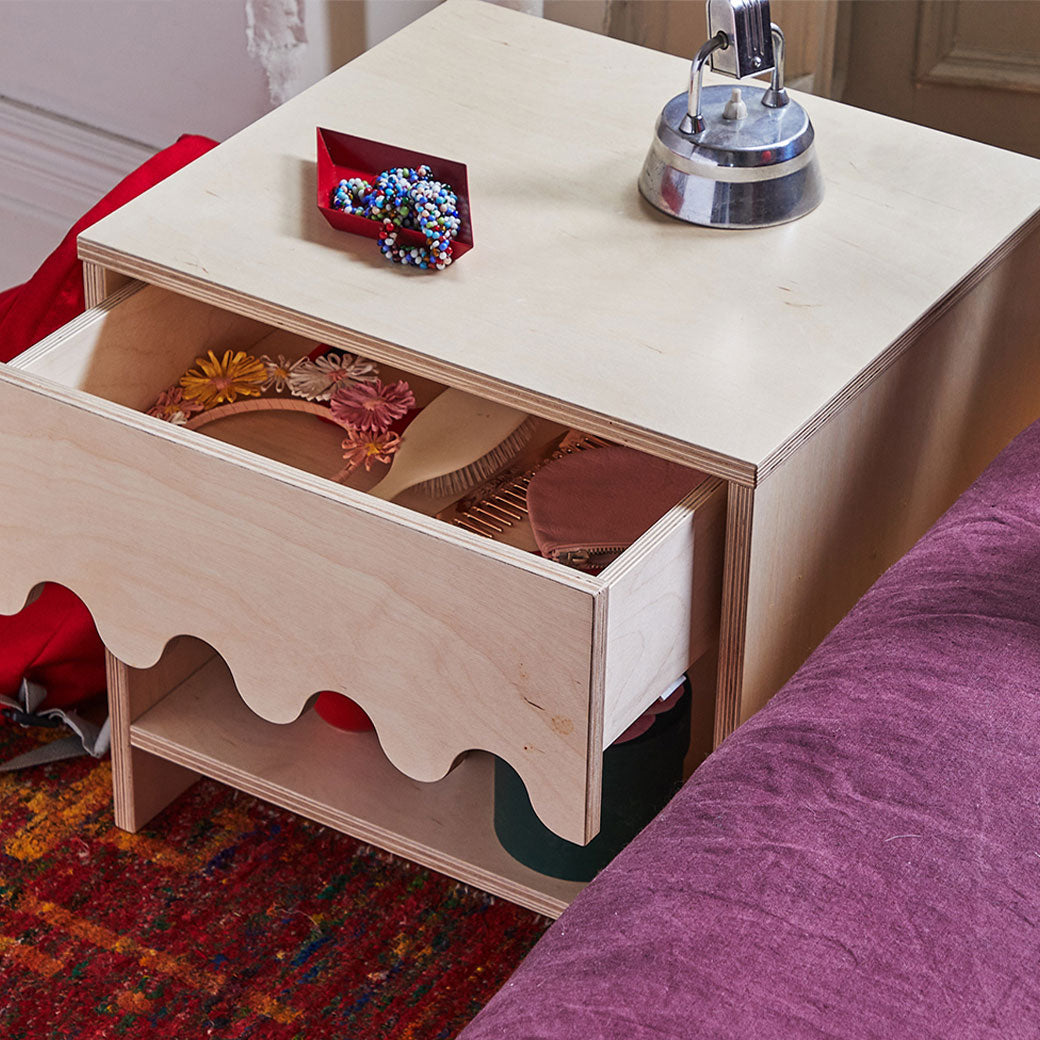 Oeuf Moss Nightstand with items in the drawer  in -- Color_Birch