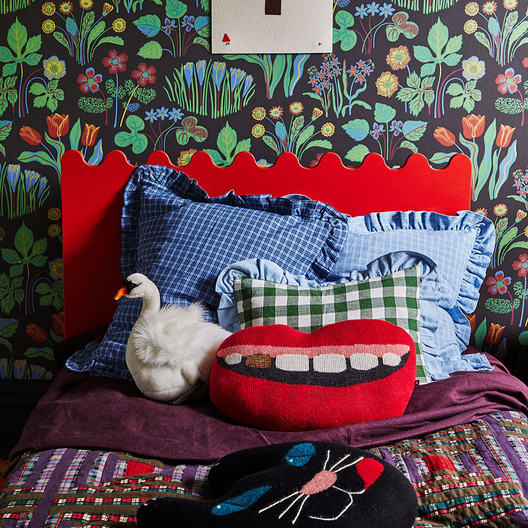 Colorful pillows on the Oeuf Moss Twin Bed in -- Color_Tomato