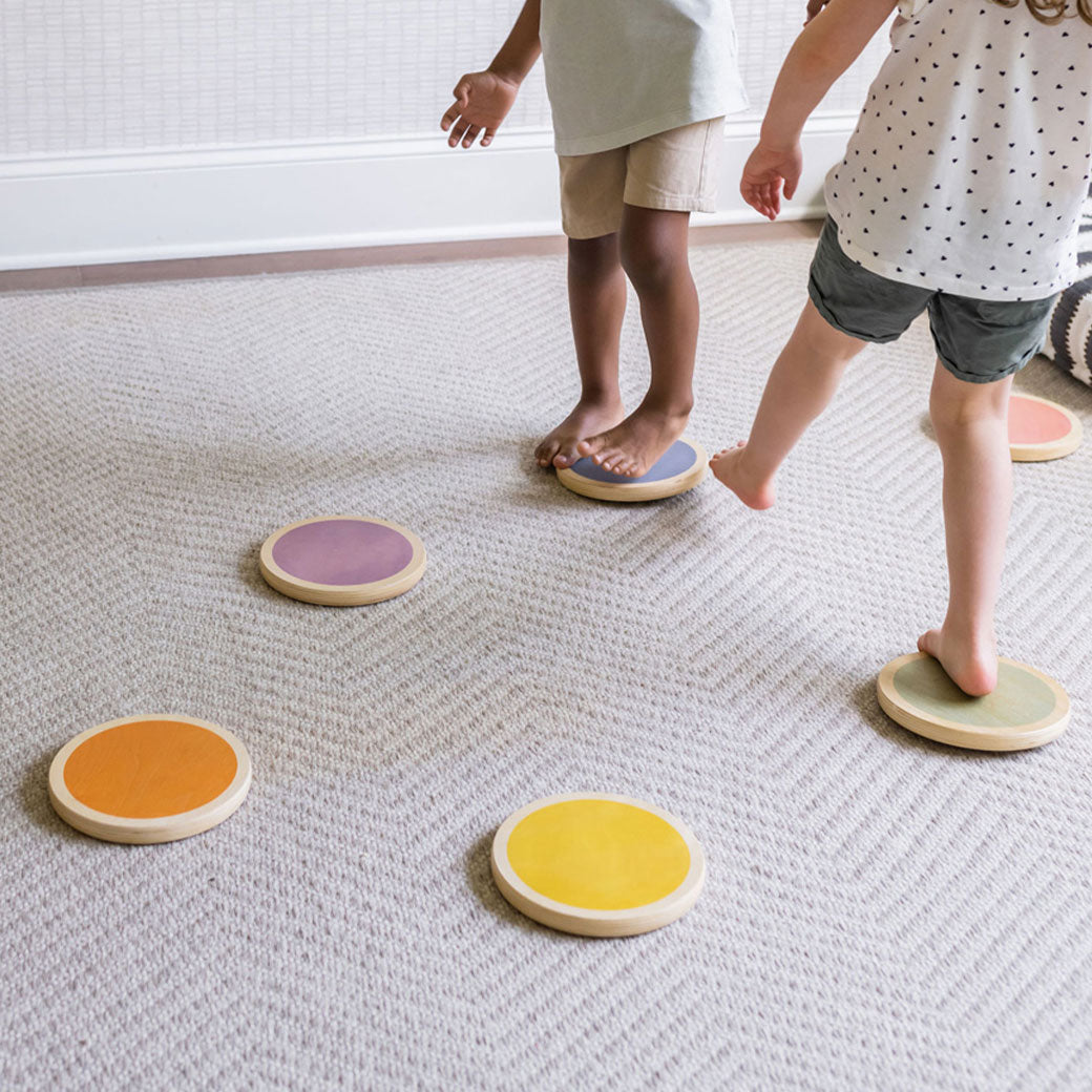 Two kids playing on Poppyseed Play Stepping Stones