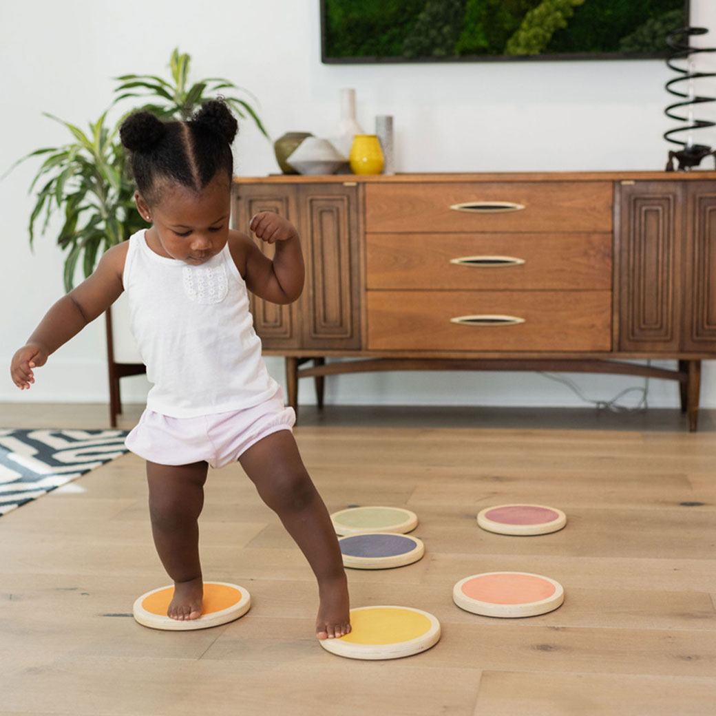 Toddler playing on the Poppyseed Play Stepping Stones