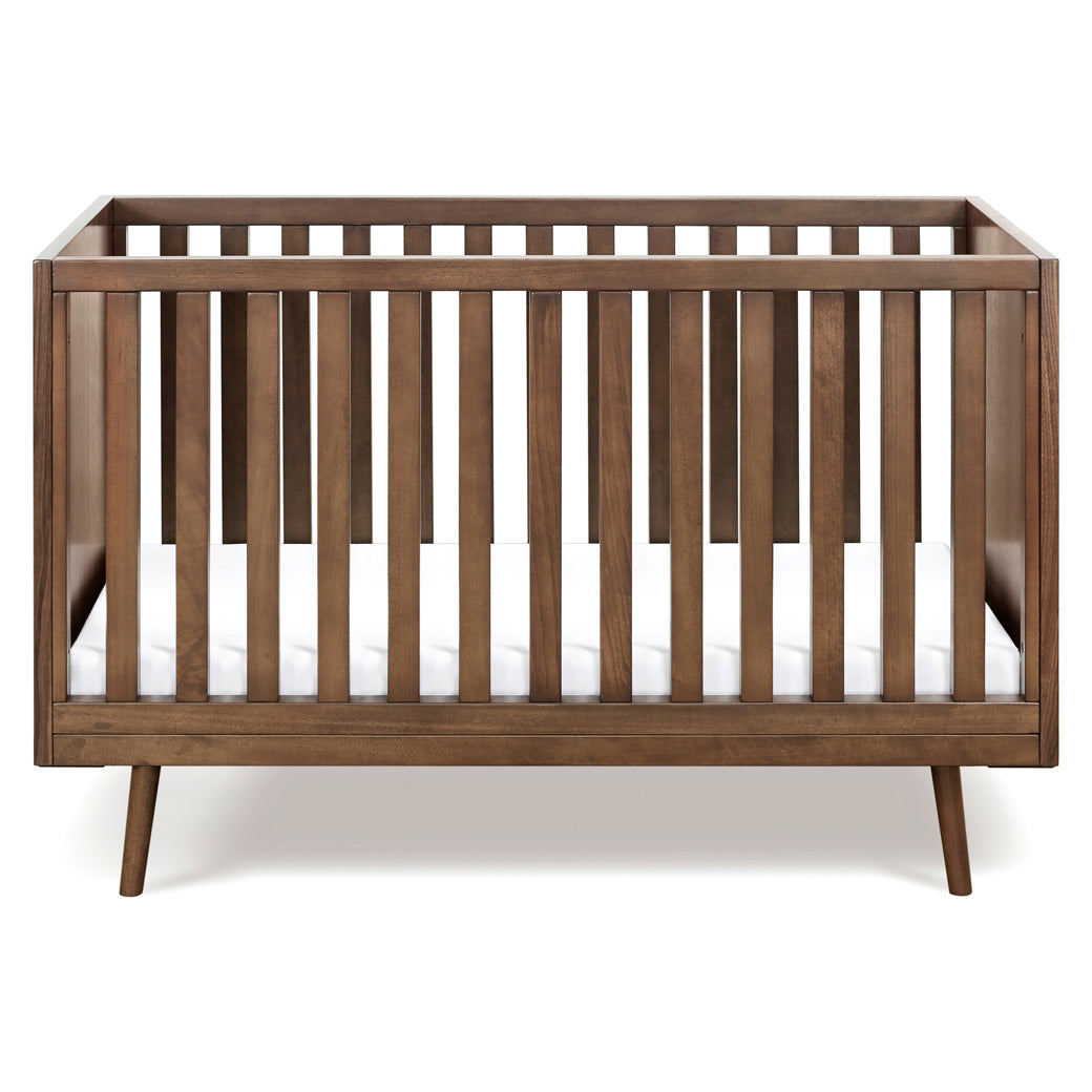 Front view of Ubabub Nifty Timber 3-In-1 Crib in -- Color_Walnut