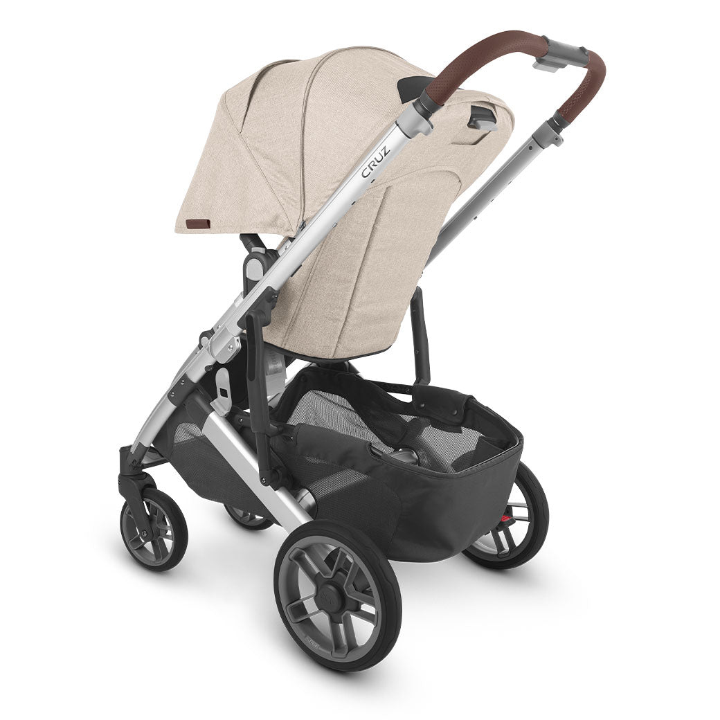 Angled back view of UPPAbaby CRUZ V2 Stroller with canopy down  in -- Color_Declan