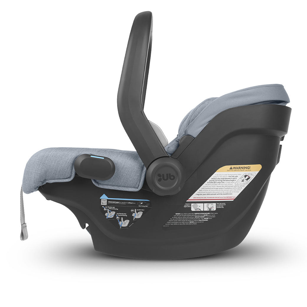 Side view of UPPAbaby MESA V2 Infant Car Seat carrier with handle up  in -- Color_Gregory