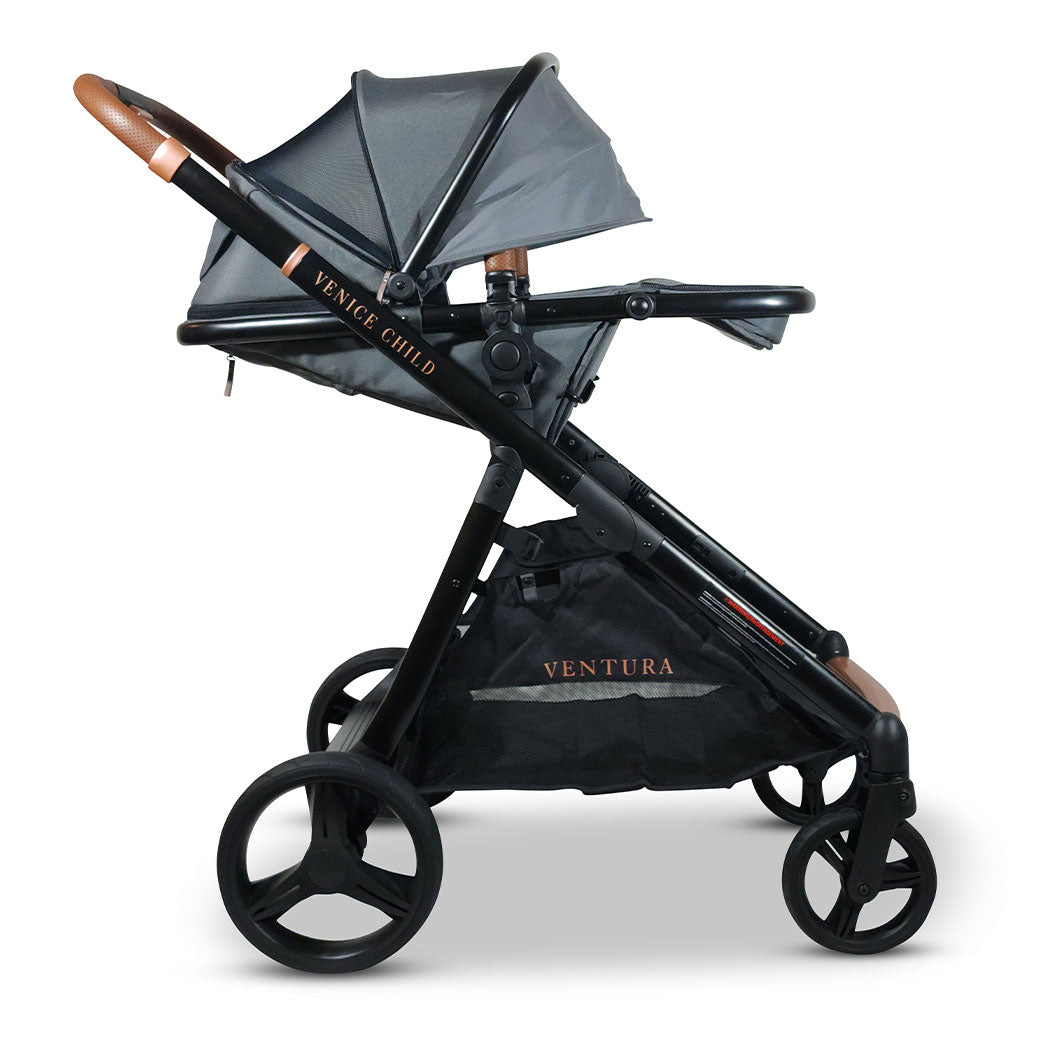 Side view of reclined Venice Child Ventura Single to Double Sit-and-Stand Stroller in -- Color_Shadow