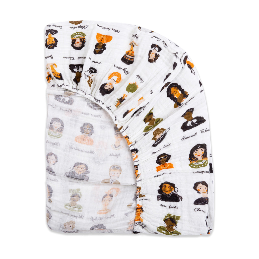 Back view of the corner of the Babyletto's Crib Sheet in GOTS Certified Organic Muslin Cotton in --Color_Women In History