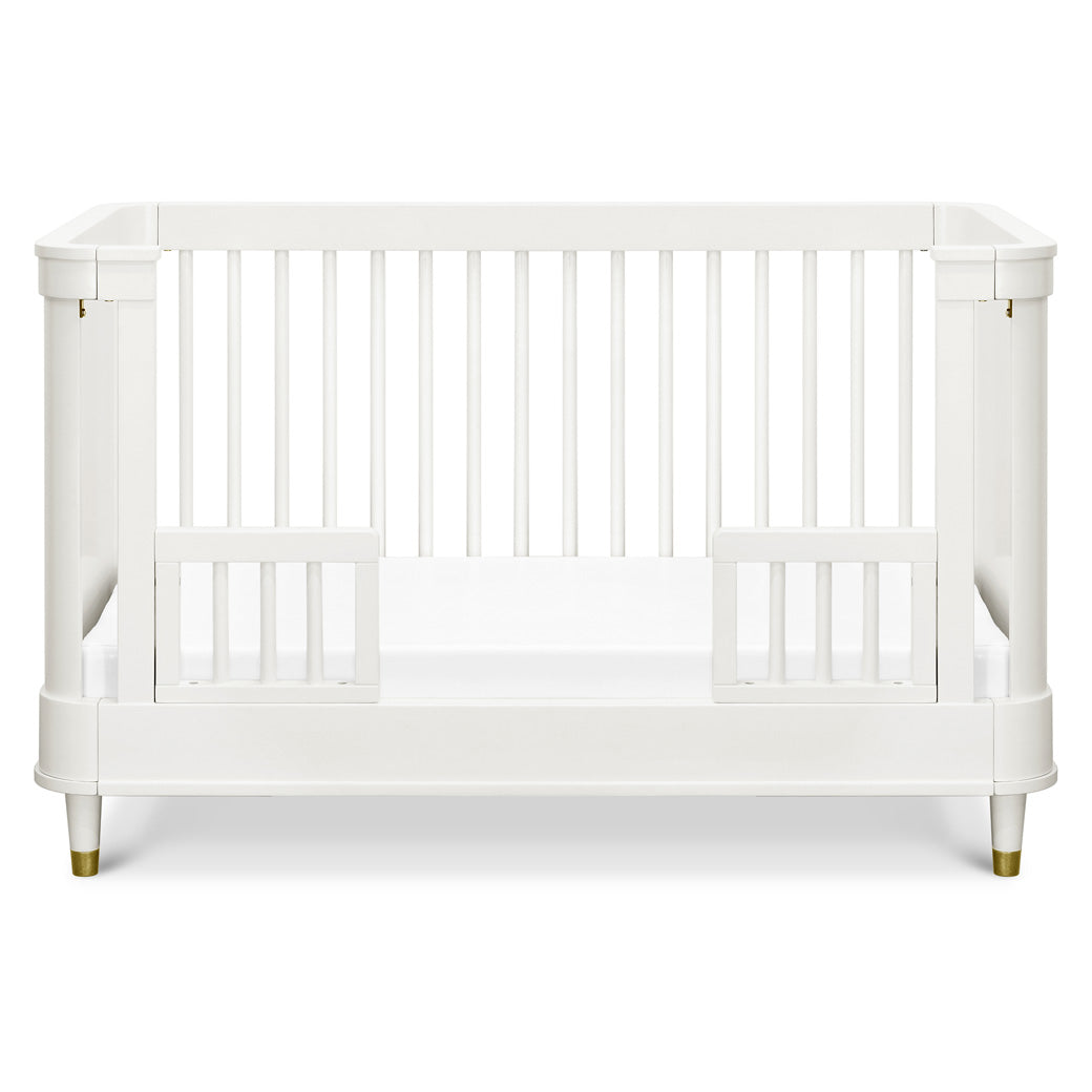 Front view of Namesake's Tanner 3-in-1 Convertible Crib as a toddler bed 
