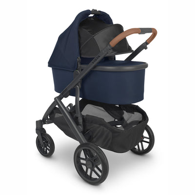 Side view of UPPAbaby Vista V2 Double Stroller with the bassinet in -- Color_Noa