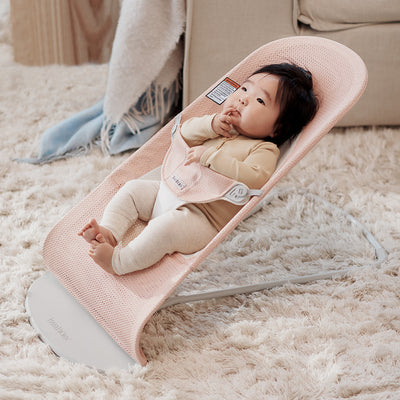 Baby sitting in BABYBJÖRN Bouncer Balance Soft in -- Color_Pearly Pink/White Mesh
