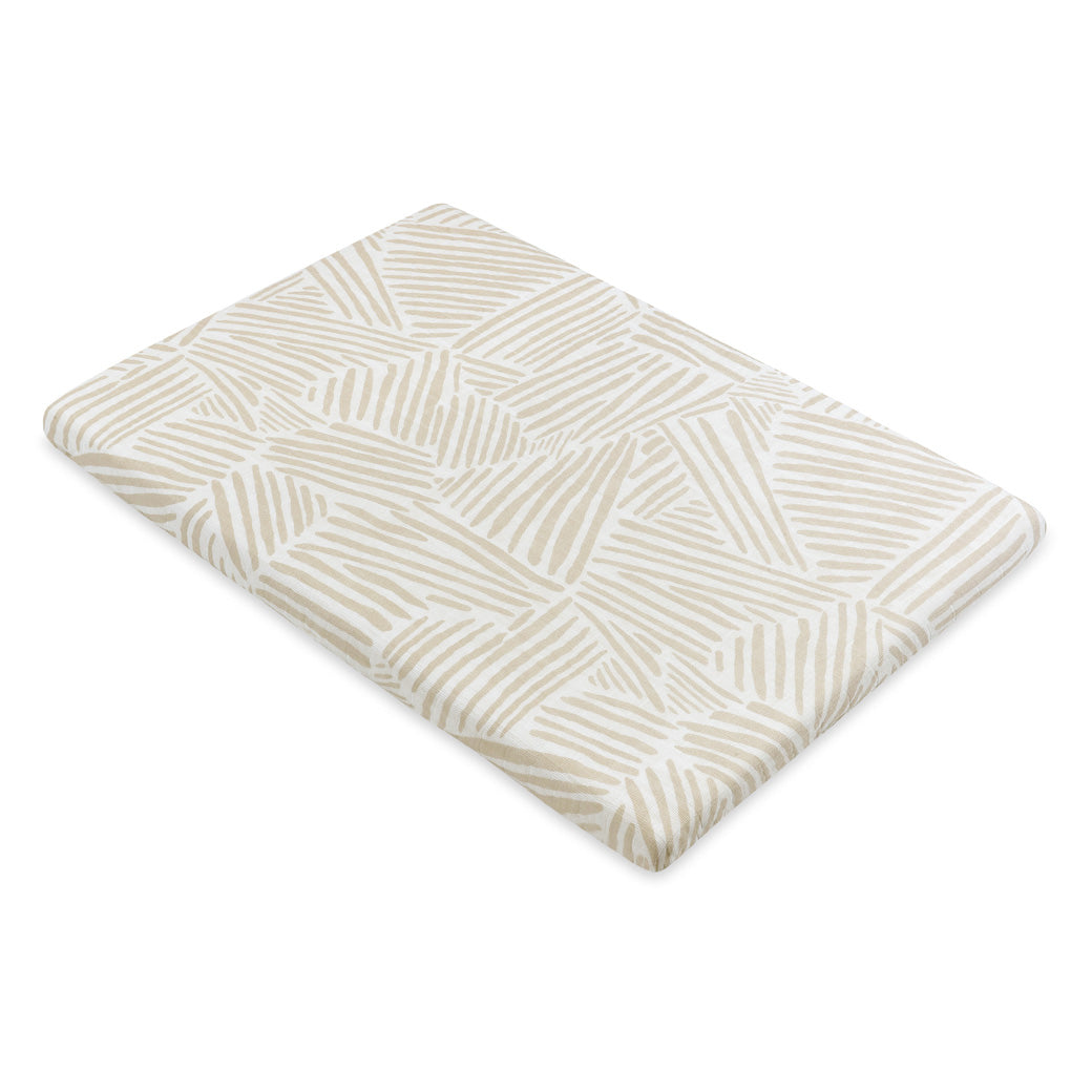 Full view of the Babyletto All-Stages Bassinet Sheet In GOTS Certified Organic Muslin Cotton in -- Color_Oat Stripe