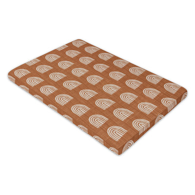 Full view of the Babyletto All-Stages Bassinet Sheet In GOTS Certified Organic Muslin Cotton in -- Color_Terracotta Rainbow