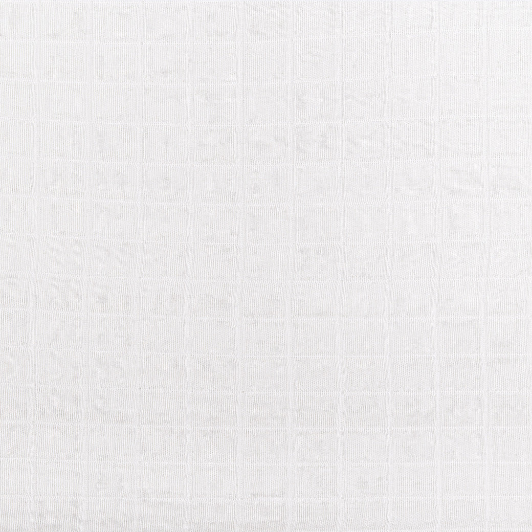 Closeup of the Babyletto All-Stages Bassinet Sheet In GOTS Certified Organic Muslin Cotton in -- Color_White