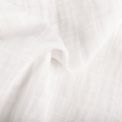 Crinkled closeup of the All-Stages Bassinet Sheet In GOTS Certified Organic Muslin Cotton in -- Color_White