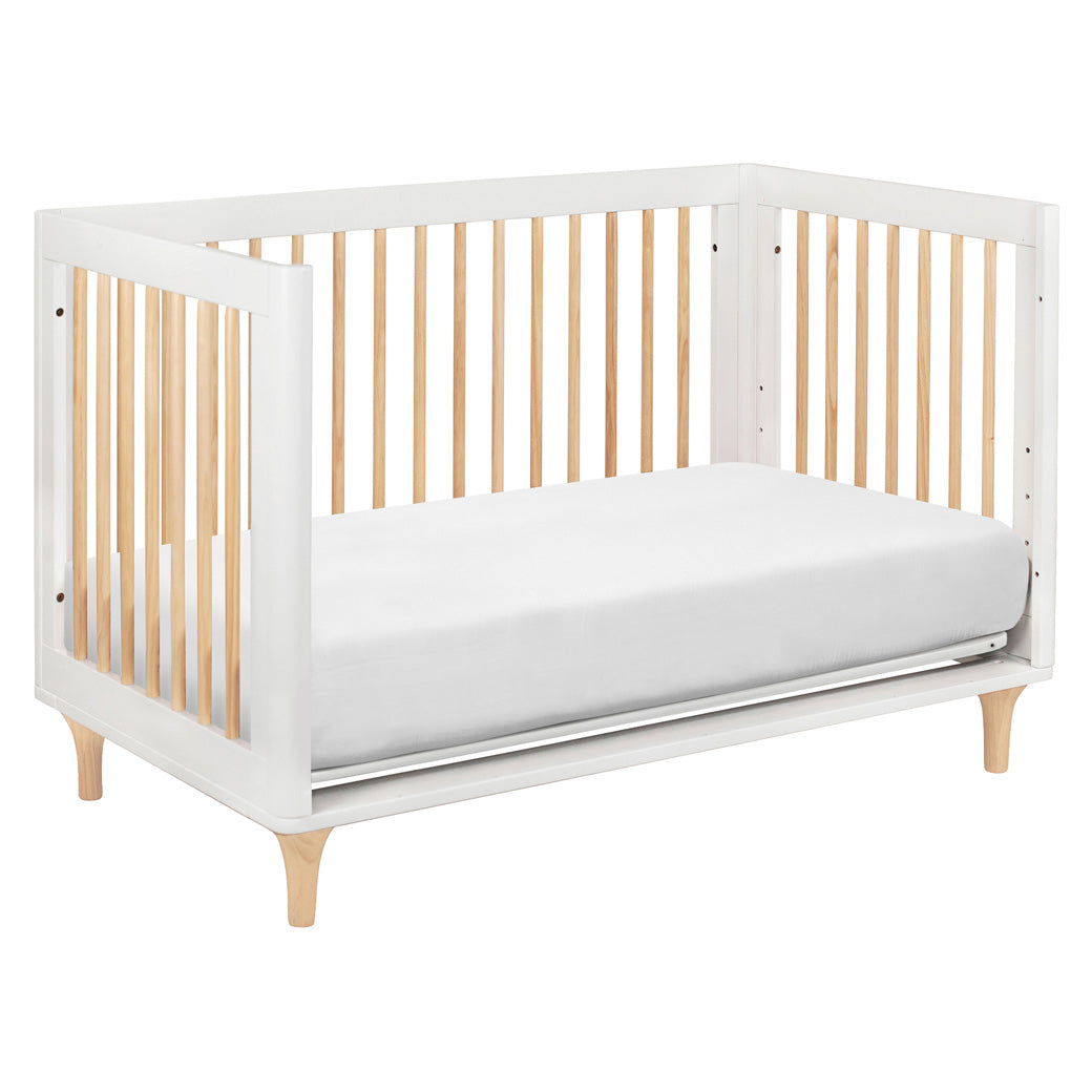 The Babyletto Lolly 3-in-1 Convertible Crib converted into a daybed in -- Color_White