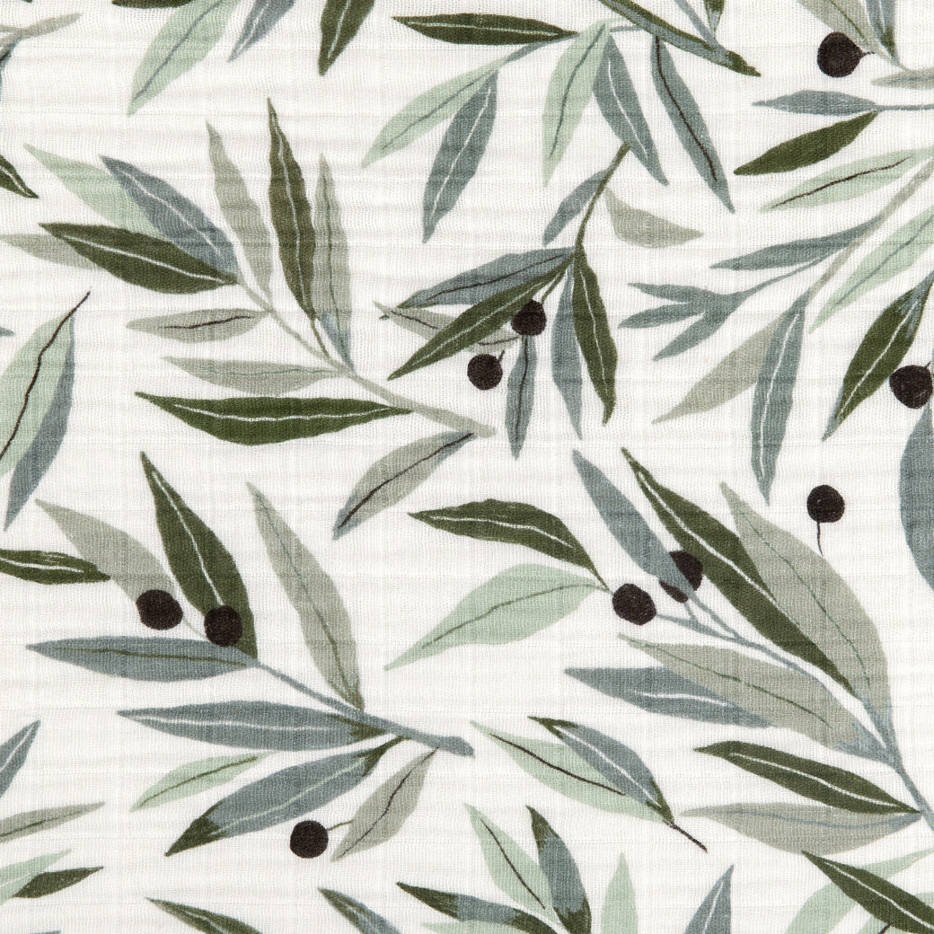 Closeup of the material of Babyletto's Quilt In 3-Layer GOTS Certified Organic Muslin Cotton in -- Color_Olive Branches