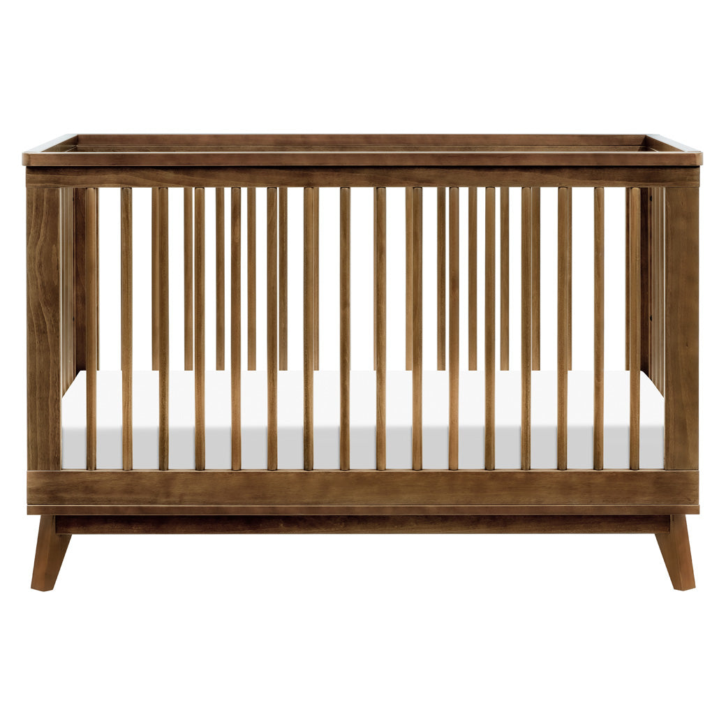 Front view of Babyletto's Scoot 3-in-1 Convertible Crib in -- Color_Natural Walnut