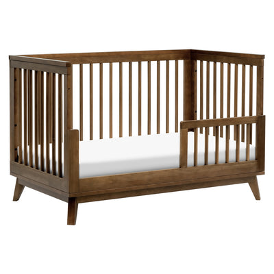 Babyletto's Scoot 3-in-1 Convertible Crib as toddler bed in -- Color_Natural Walnut