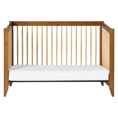 Front view of Babyletto's Sprout 4-in-1 Convertible Crib as daybed in -- Color_Chestnut / Natural
