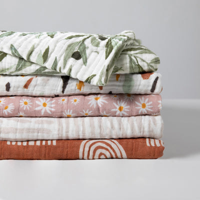Babyletto-Swaddle-In-GOTS-Certified-Organic-Muslin-Cotton--Color_Olive Branches-Terrazzo-Daisy-Oat Stripe-Terracotta Rainbow