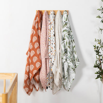 Babyletto-Swaddle-In-GOTS-Certified-Organic-Muslin-Cotton--Color_Terracotta Rainbow-Daisy-Terrazzo-Oat Stripe-Olive Branches
