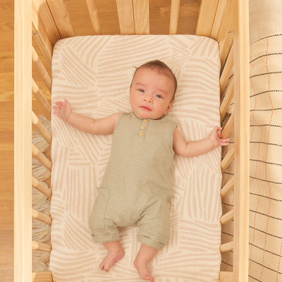 Baby in Babyletto's Yuzu 8-In-1 Convertible Crib in -- Color_Natural 