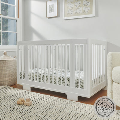 Babyletto's Yuzu 8-In-1 Convertible Crib in a baby room in -- Color_White