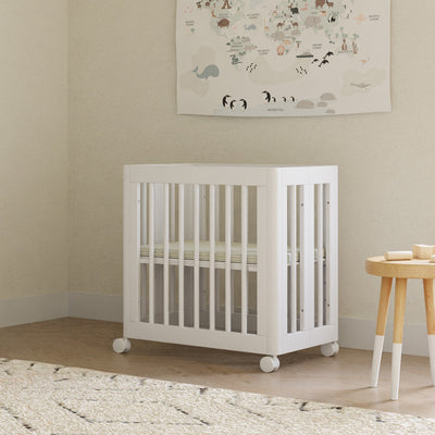 Babyletto's Yuzu 8-In-1 Convertible Crib With All Stages Conversion Kits in a baby room in -- Color_White