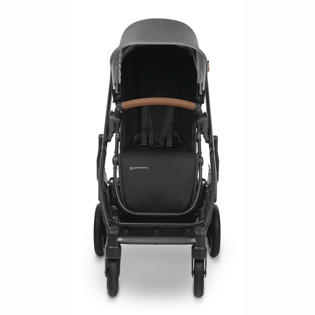 Front view of front-facing uppababy cruz v2 stroller with black frame and heather grey fabric -- Color_Greyson
