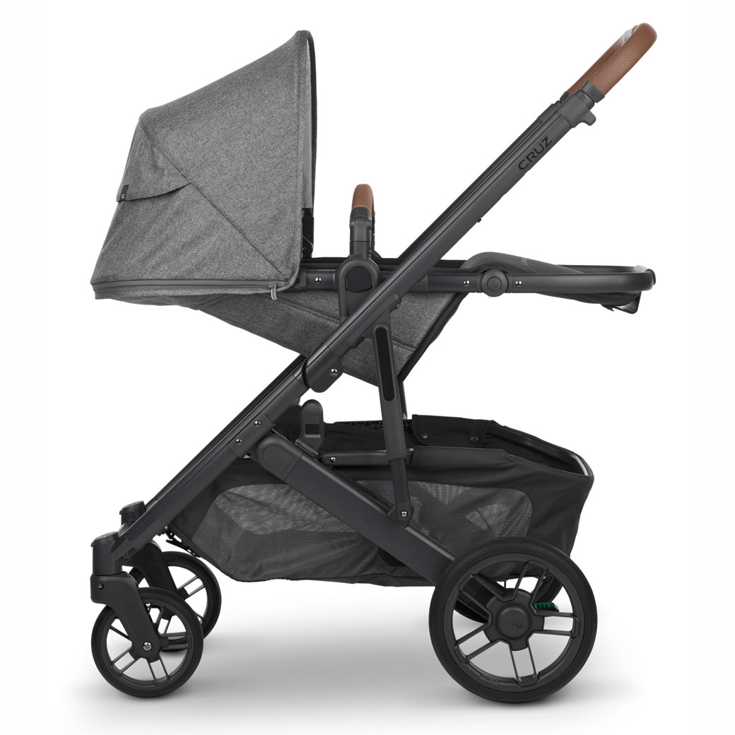 Side view of reversed UPPAbaby CRUZ V2 Stroller fully reclined  in -- Color_Greyson