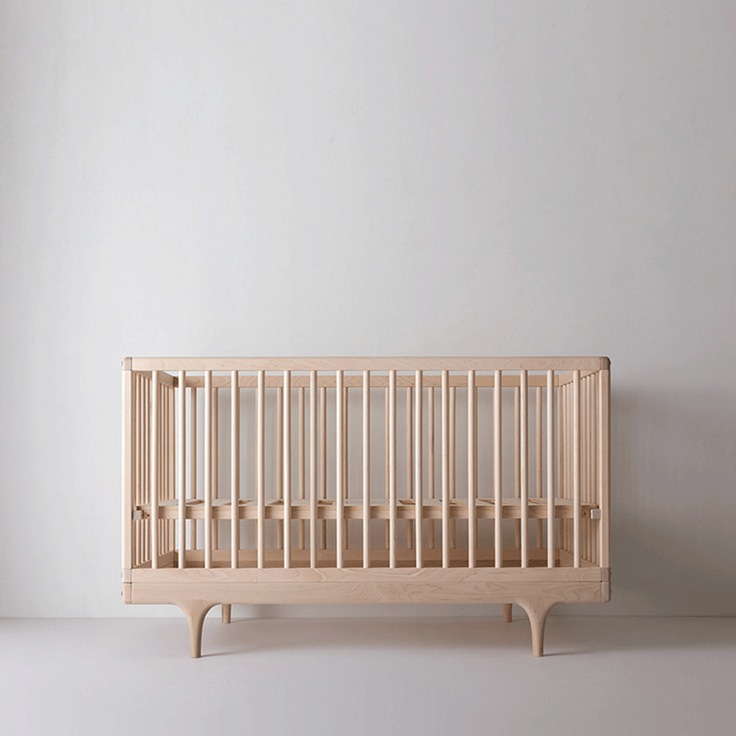 Kalon Caravan Crib with the mattress support higher  in -- Color_Oiled Ash