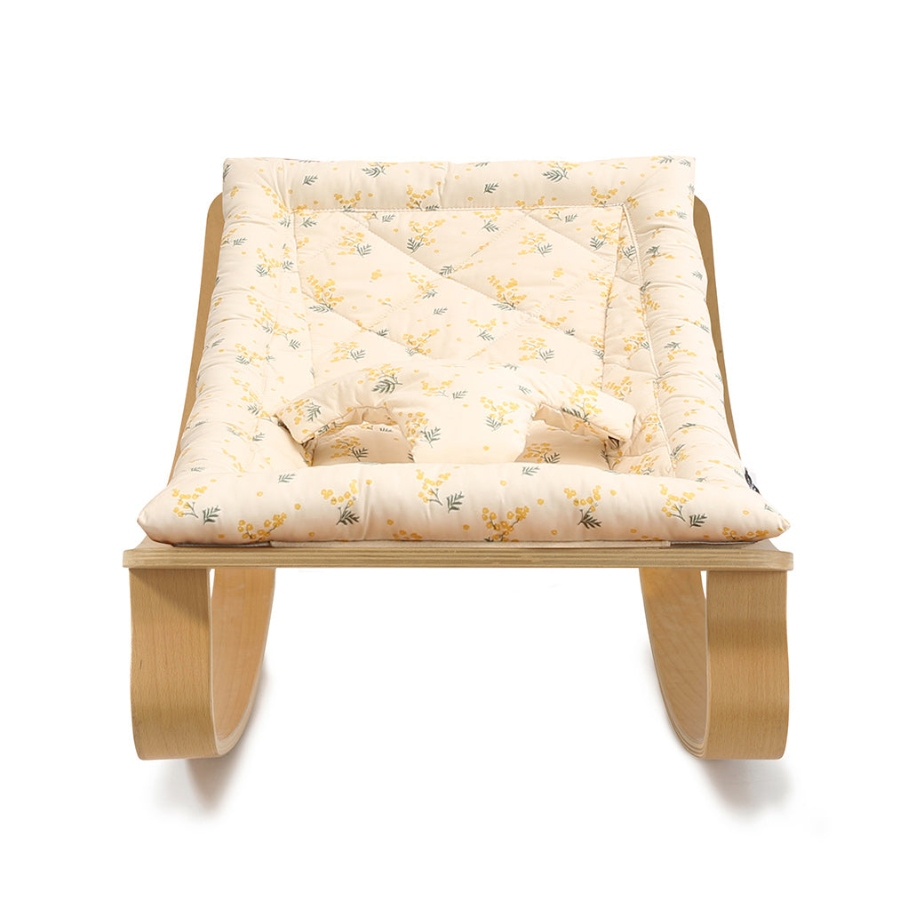 Front view of Charlie Crane LEVO Baby Rocker in -- Color_Garbo And Friends Mimosa _ Beech