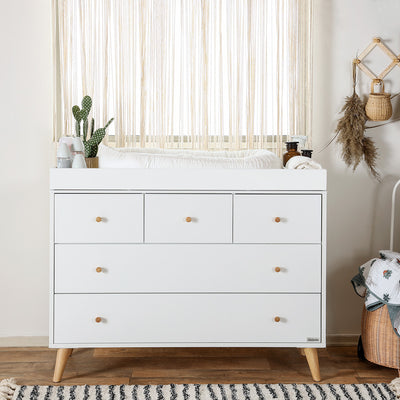 Front view of Dadada Austin 5-Drawer Dresser with tray under a window  in -- Color_White/Natural