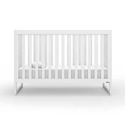 Front view of Dadada Austin 3-in-1 Crib with mattress on the bottom  in -- Color_White