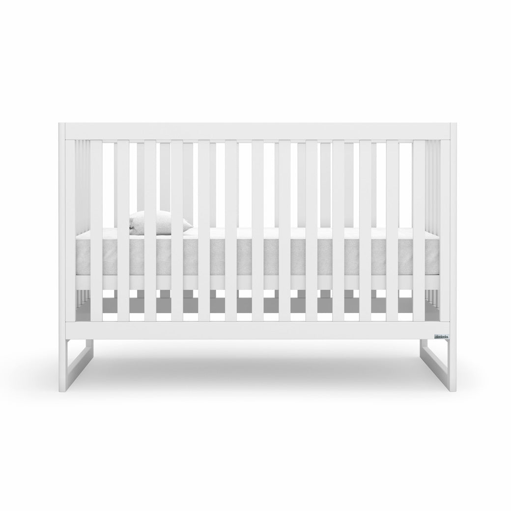 Front view of Dadada Austin 3-in-1 Crib with mattress in the middle  in -- Color_White