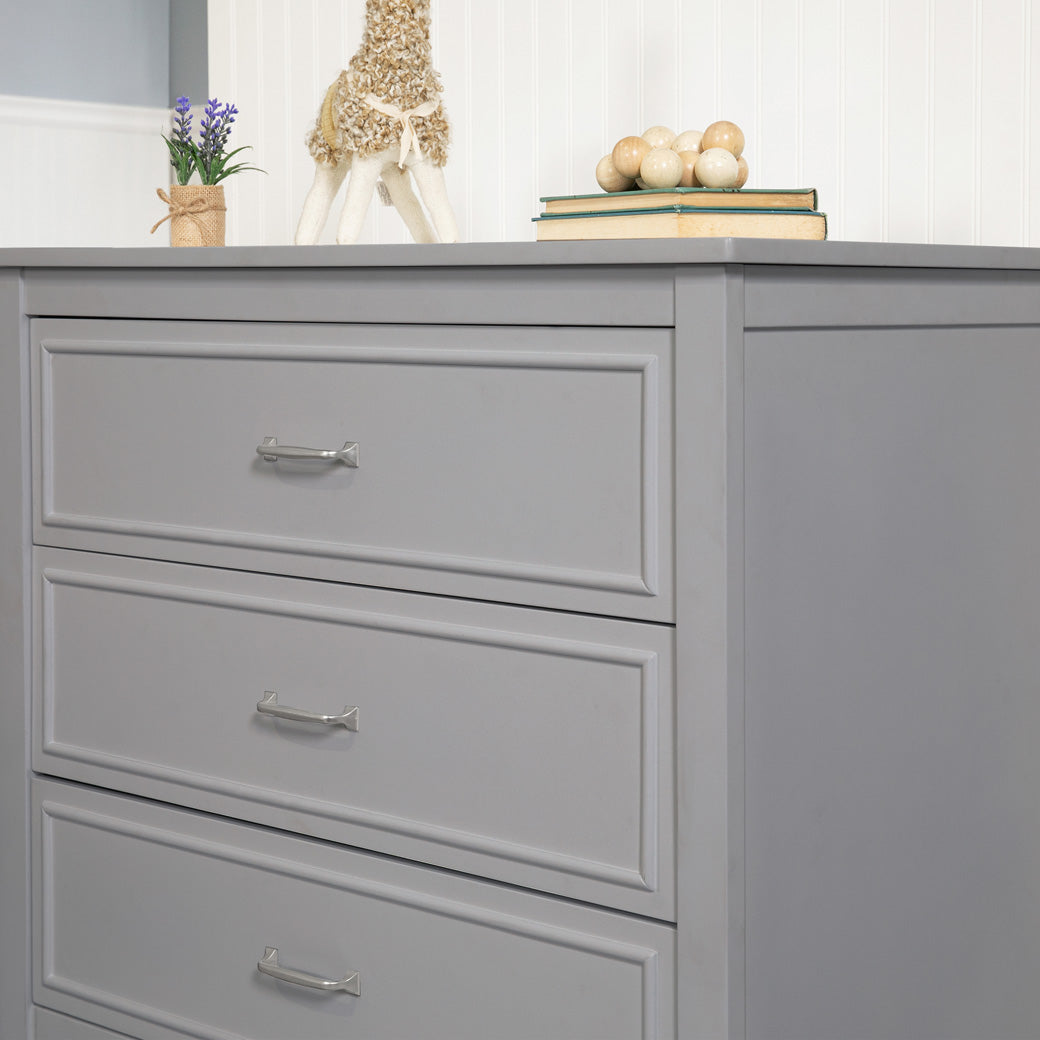 Closeup lifestyle photo of The DaVinci Charlie 3-Drawer Dresser in -- Color_Grey