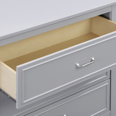 Closeup of The DaVinci Charlie 3-Drawer Dresser open drawer in -- Color_Grey