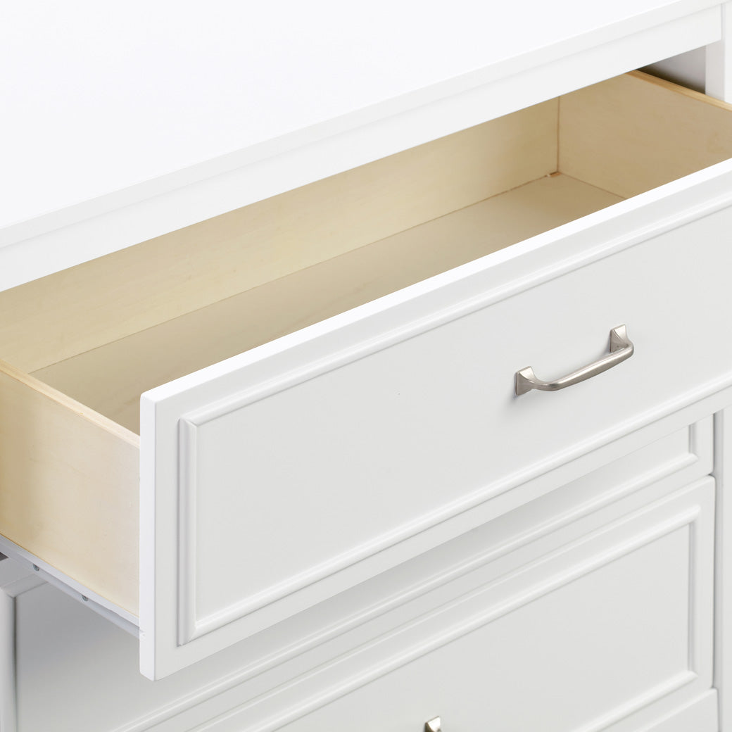 Closeup of The DaVinci Charlie 3-Drawer Dresser open drawer in -- Color_White