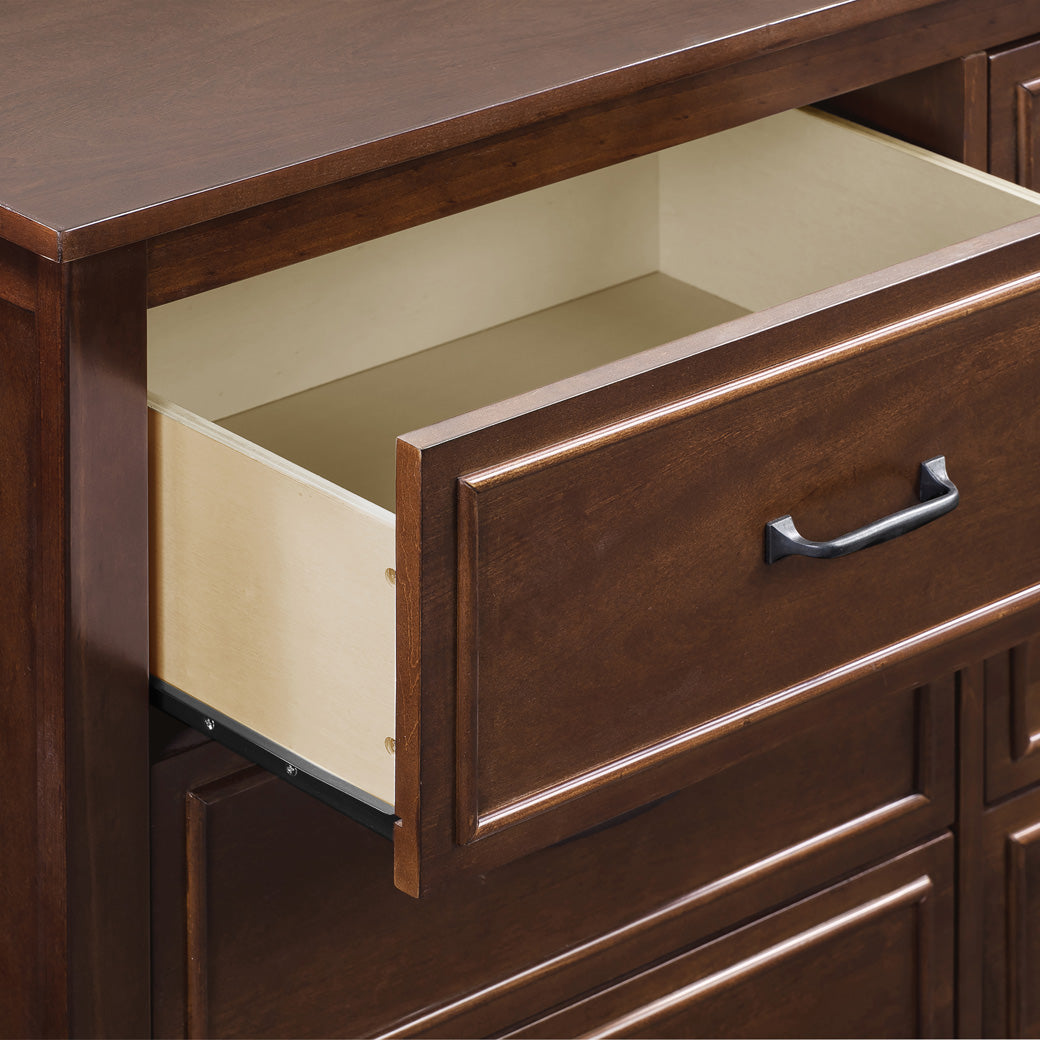 Closeup of open drawer of The DaVinci Charlie 6-Drawer Dresser in -- Color_Espresso