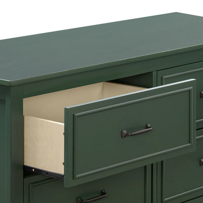 Closeup of open drawer of The DaVinci Charlie 6-Drawer Dresser in -- Color_Forest Green