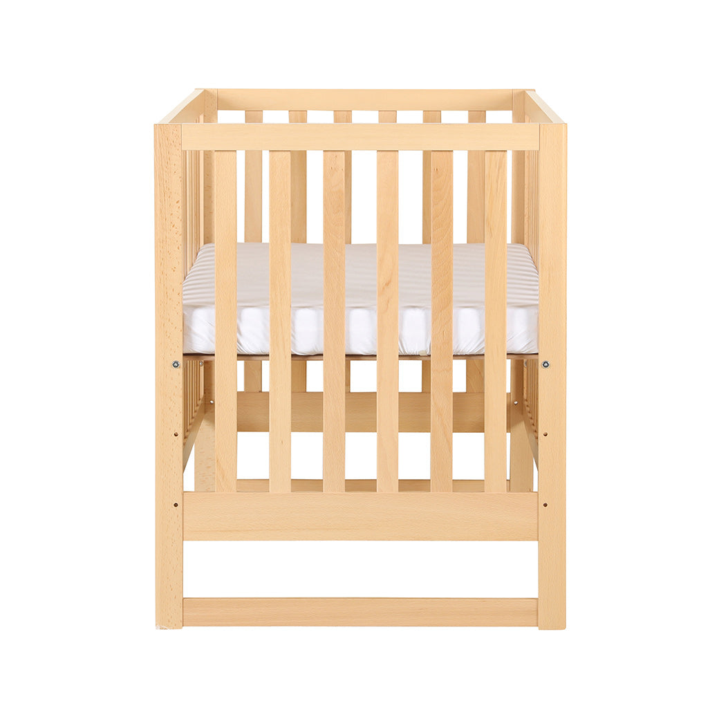 Side view of Dadada Austin 3-in-1 Crib in -- Color_Natural