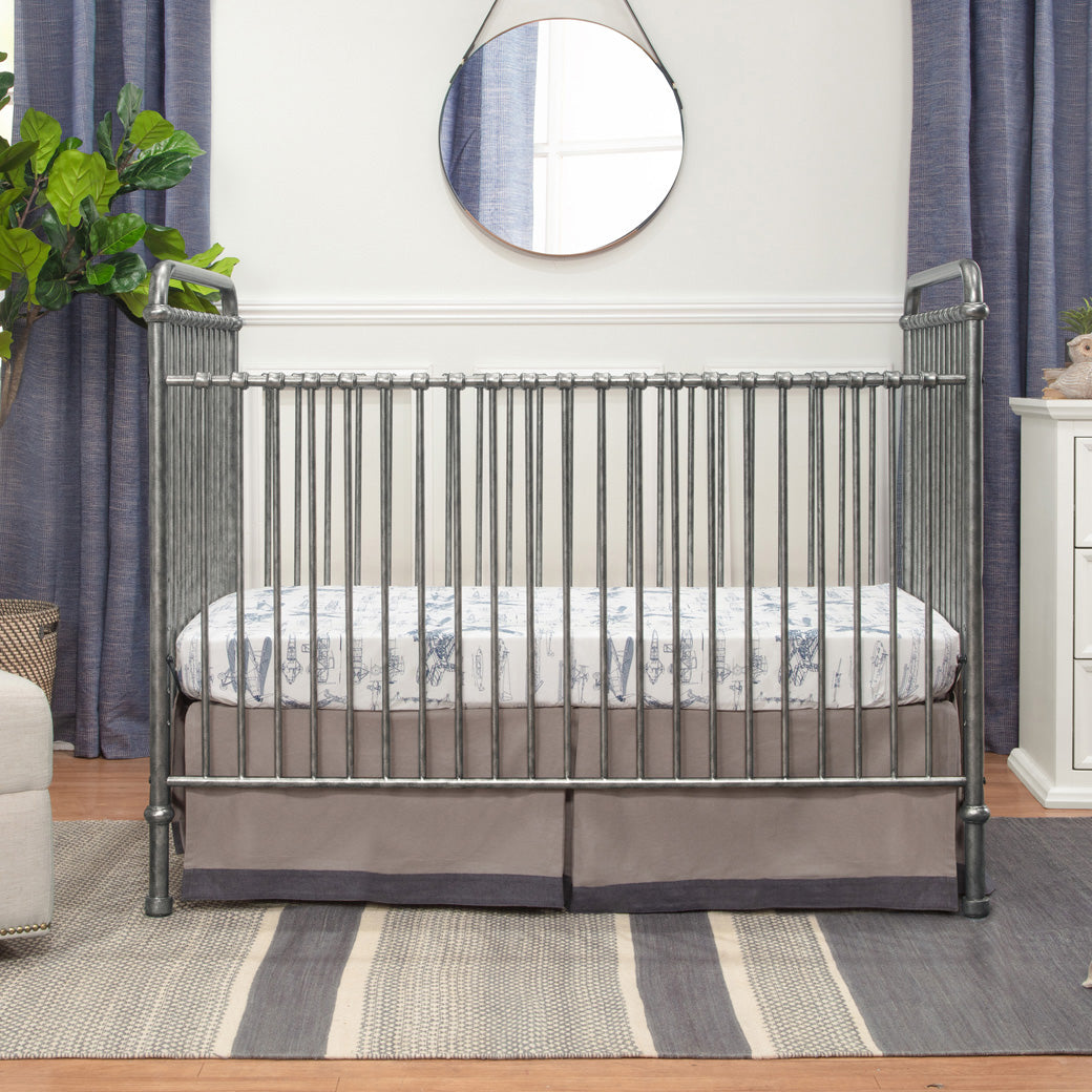 Lifestyle front view of Namesake`s Abigail 3 in 1 Crib in -- Color_Vintage Silver