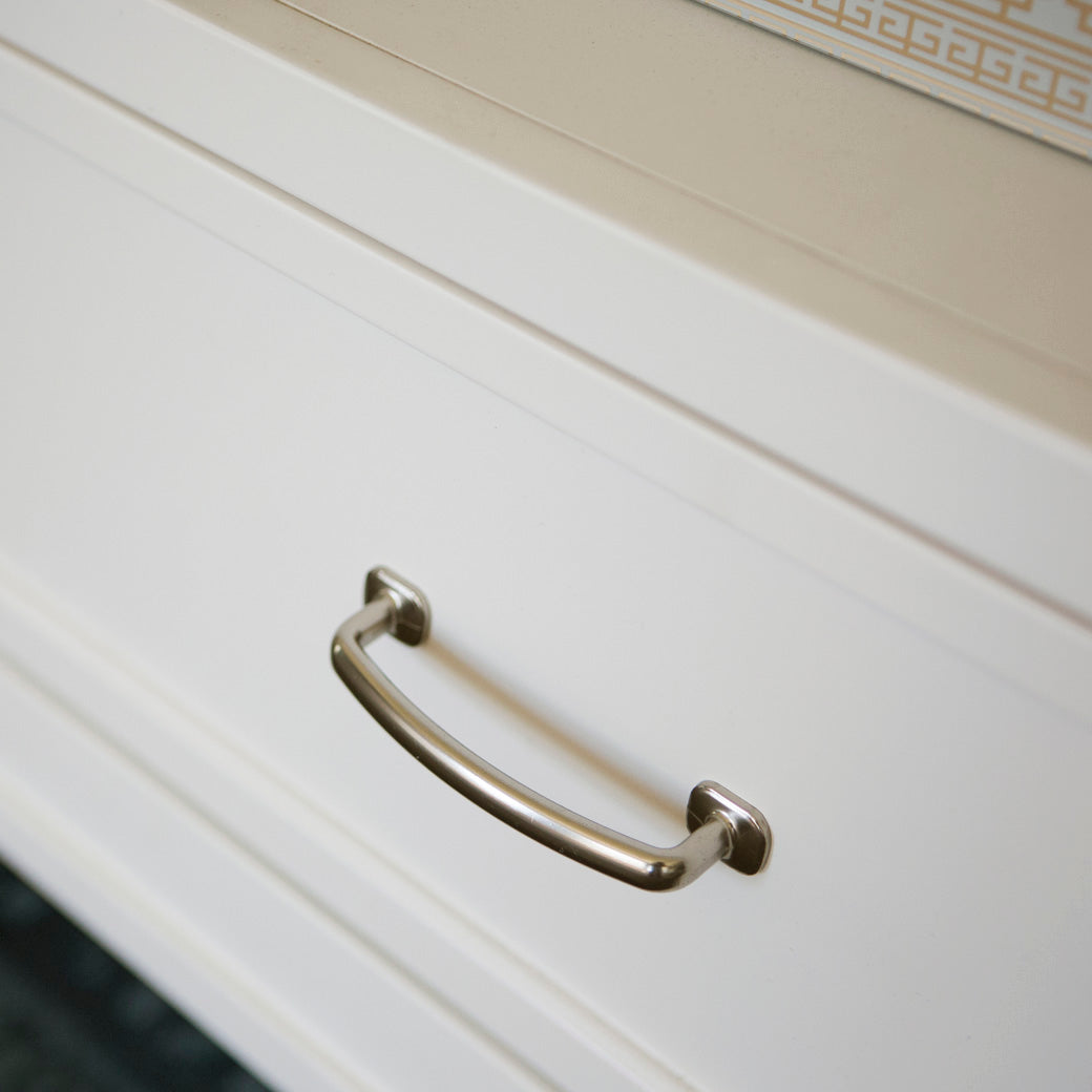 Closeup of the drawer handle of the Namesake's Darlington Bookcase in Warm White
