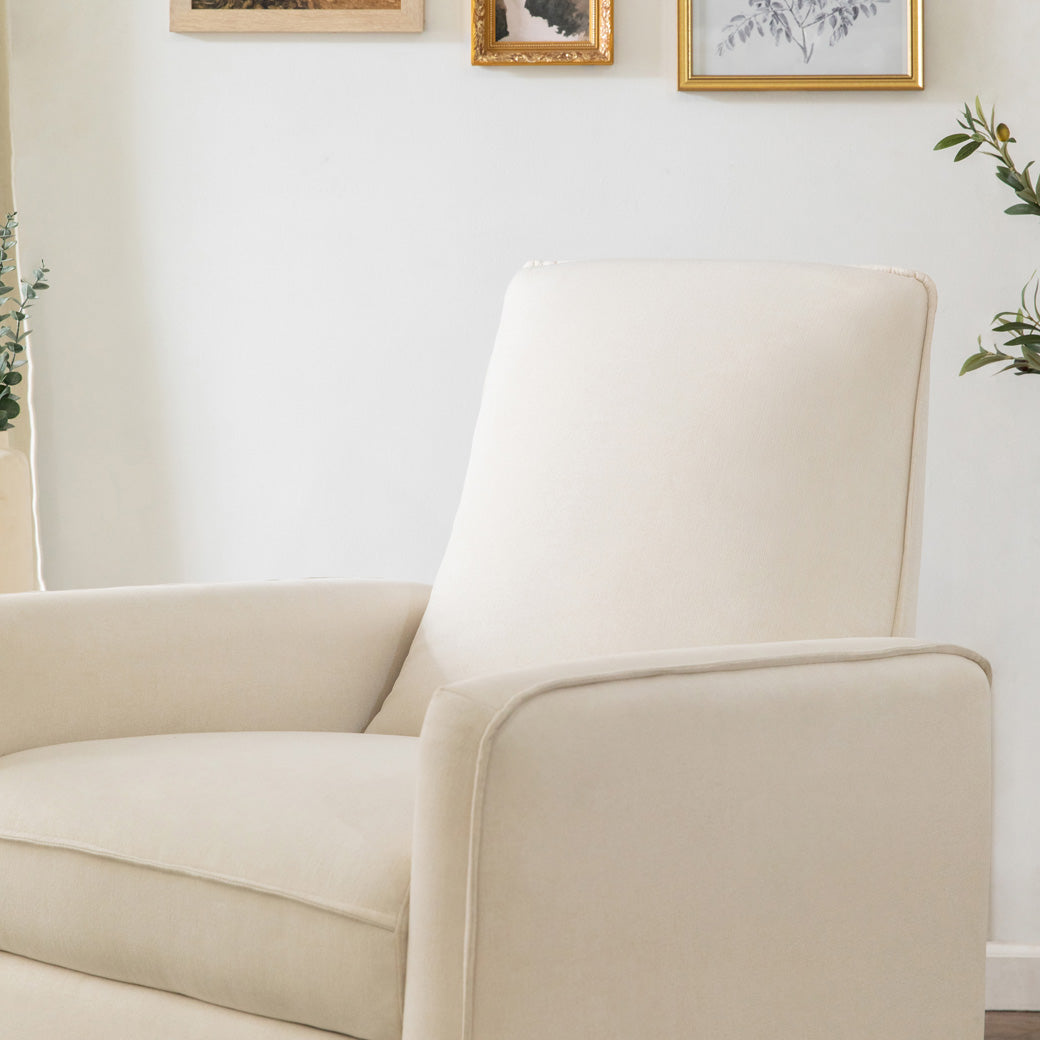 Closeup of DaVinci's Penny Recliner And Swivel Glider in a room in -- Color_Performance Cream Eco-Weave